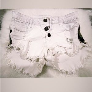 White shorts w/ side designs